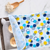 Large 24x18-inch reusable sheet pan proofing cover, non-stick and waterproof, in geometric circles print, made from BPA-free, food-safe fabric.  Hand made in Canada.