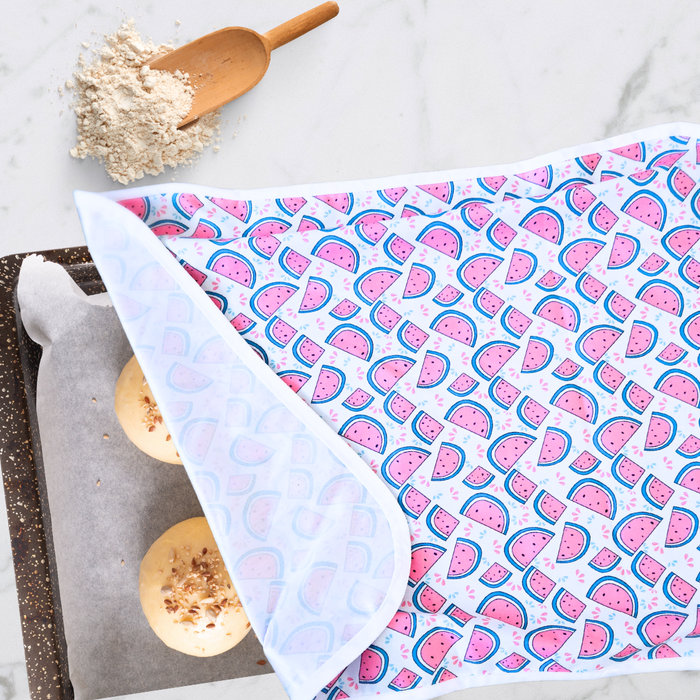 Eco-friendly, reusable non-stick Cookie sheet pan proofing cover / dish cover in a watermelon print, perfect for covering dough while proofing and keeping dough moist while proofing.