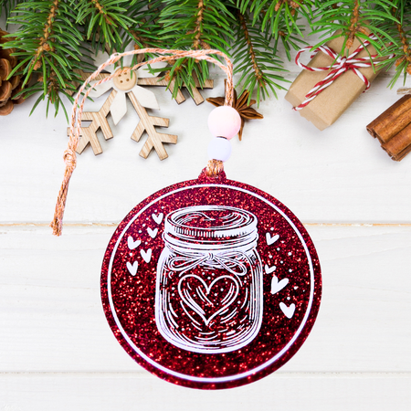 Sourdough-themed Christmas ornament on red glittery acrylic, featuring a starter jar radiating hearts hand-painted in white